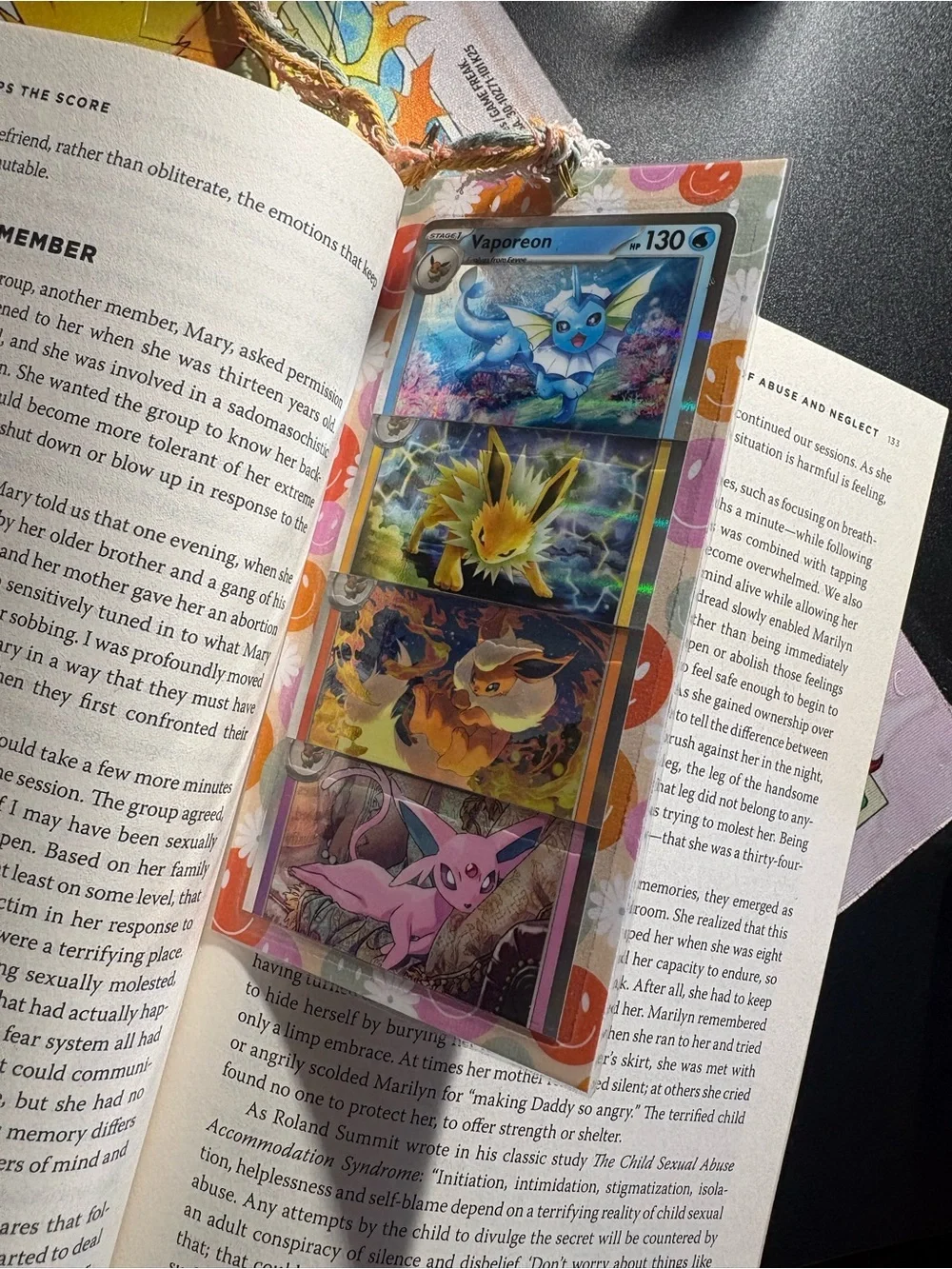 Pokemon Eeveelutions Card Sleeve with Vibrant Orange and Pink Accents